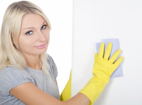Wandsworth cleaner using PPE during a professional cleaning task